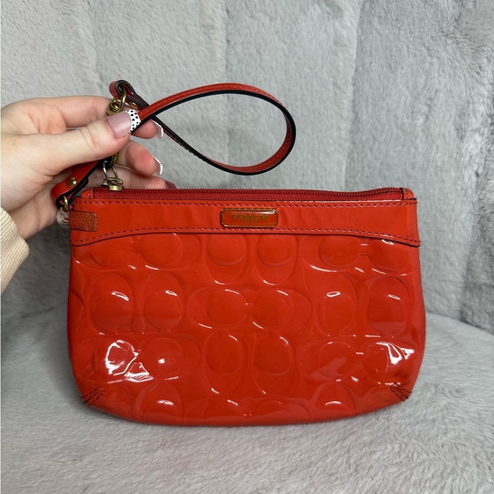 SOLD - Coach Papaya Red/ Orange Patent Leather Wristlet